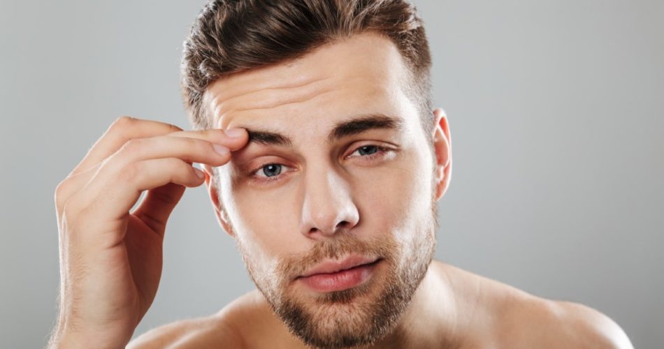 close up beauty portrait young bearded man